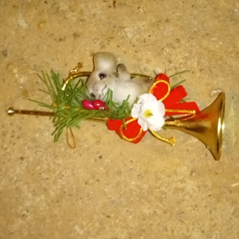 grey mus on a trumpet ornament